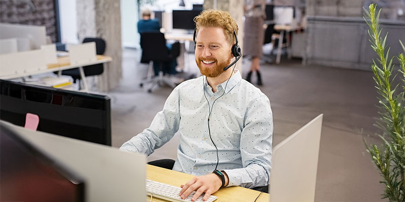 Tech support representative talking on phone